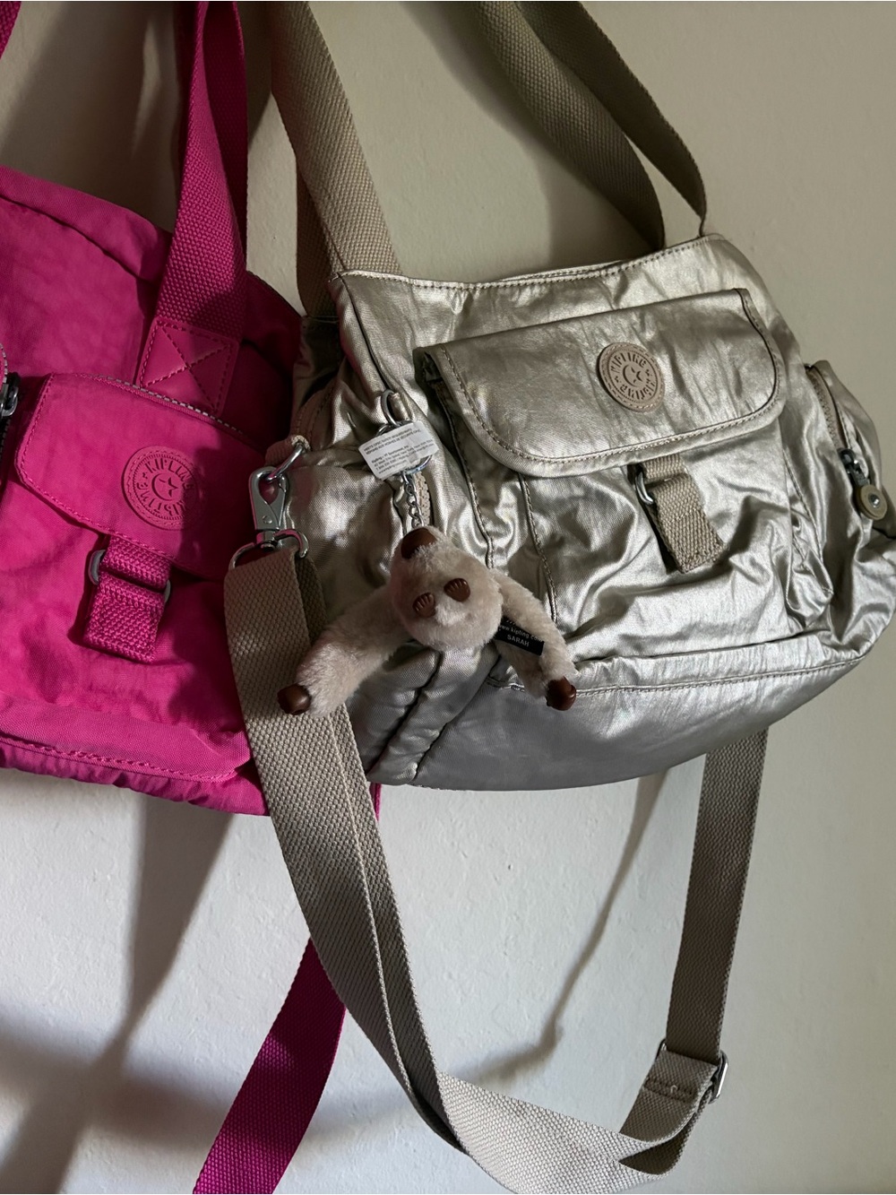 Kipling Silver Metallic Crossbody with Plush Monkey Charm